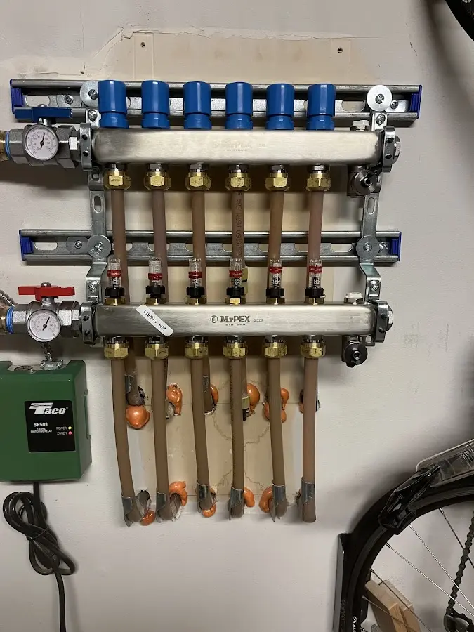 Plumber performing Leak Detection at a residential property in London